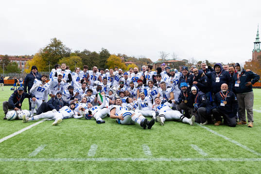 Players and staff of Italy celebrates