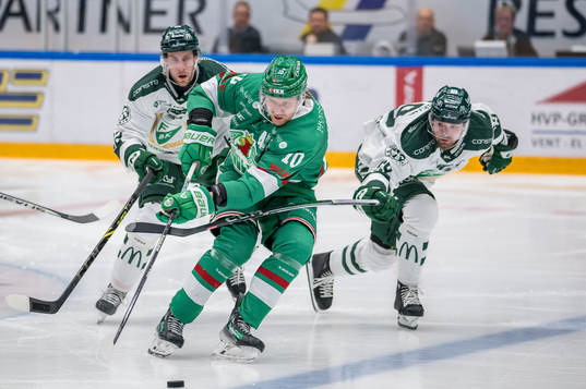 Färjestads Per Åslund och Lucas Forsell och Rögles