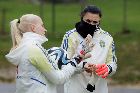 goalkeeper Emma Holmgren and Zecira Musovic  of the Swedish