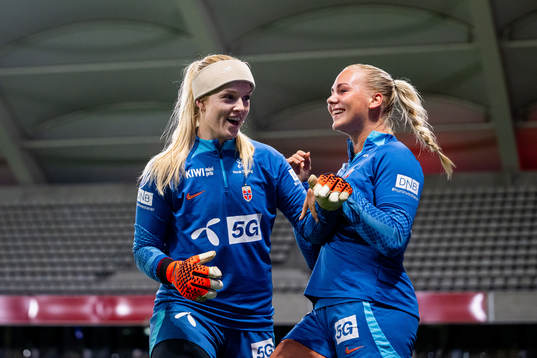 Goalkeeper Guro Pettersen and Cathinka Tandberg of the