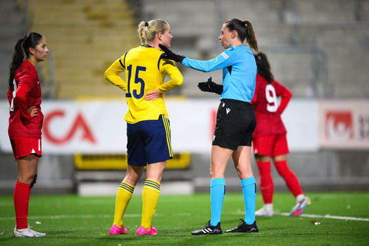 Alexandra Larsson of Sweden and Referee Alexandra Collin