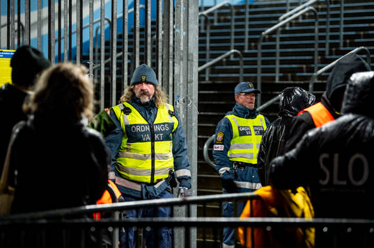 Security personel outside of the arena