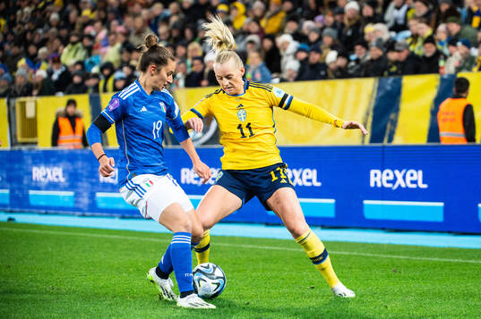 Martina Lenzini of Italy and Stina Blackstenius of Sweden