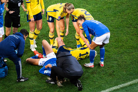 Michela Cambiaghi of Italy and Caroline Seger of Sweden