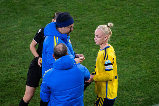 Caroline Seger of Sweden receives medical attention