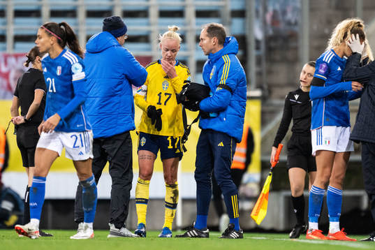 Caroline Seger of Sweden receives medical attention