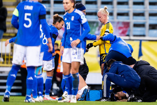Caroline Seger of Sweden receives medical attention