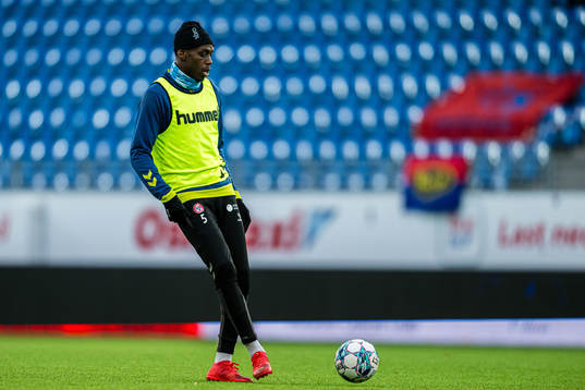 Akinsola Ihayere Azeez Akinyemi of KFUM warms up