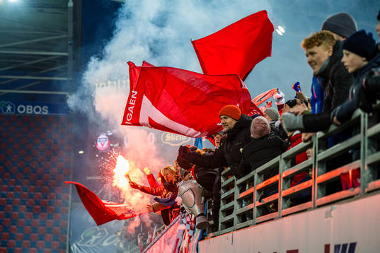 Spectators in the stands celebrates