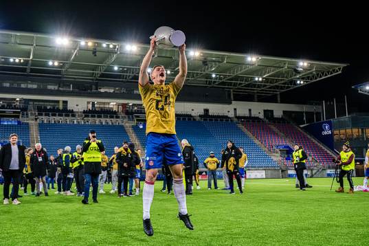 Kristoffer Lassen Harrison of KFUM celebrates promotion to