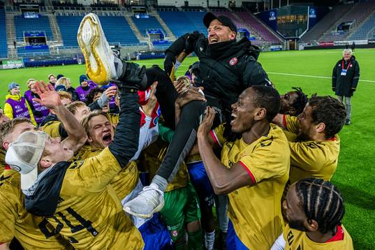 Johannes Moesgaard, head coach of KFUM, celebrates