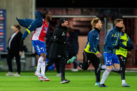 Obilor Denzel Okeke of KFUM celebrates at the final whistle