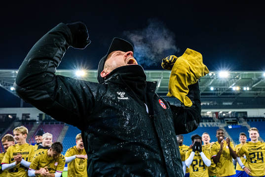 Johannes Moesgaard, head coach of KFUM, celebrates