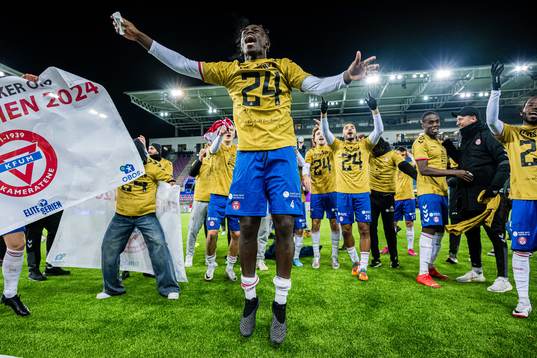 Momodou Lion Njie of KFUM celebrates promotion to the