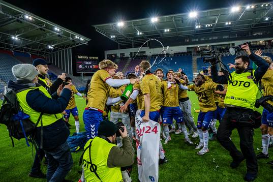 Players of KFUM celebrates promotion to the Eliteserien