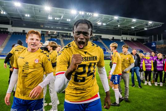 Momodou Lion Njie of KFUM celebrates promotion to the