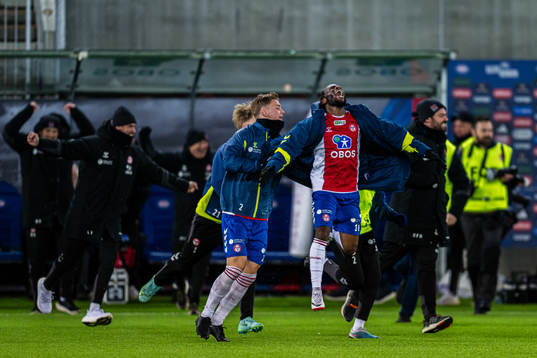 Obilor Denzel Okeke of KFUM celebrates at the final whistle