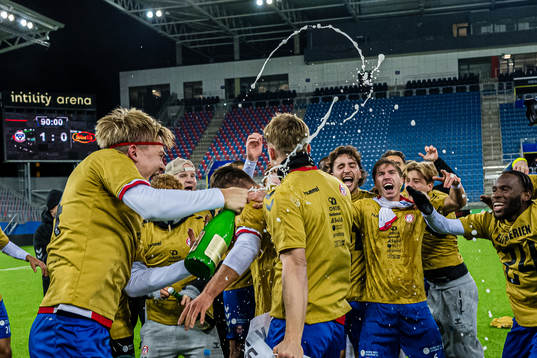 Players of KFUM celebrates promotion to the Eliteserien