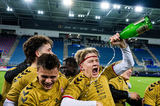 Players of KFUM celebrates