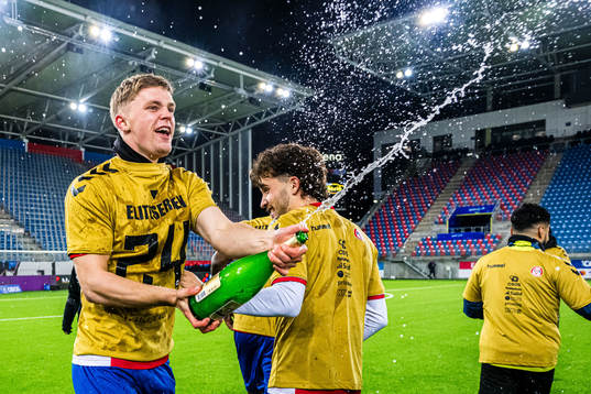Players of KFUM celebrates