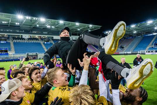 Johannes Moesgaard, head coach of KFUM, celebrates