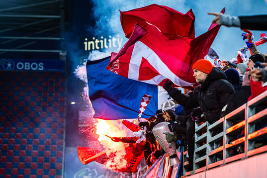 Spectators in the stands celebrates