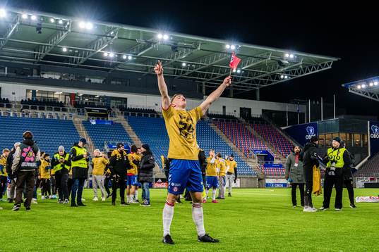 Kristoffer Lassen Harrison of KFUM celebrates promotion to