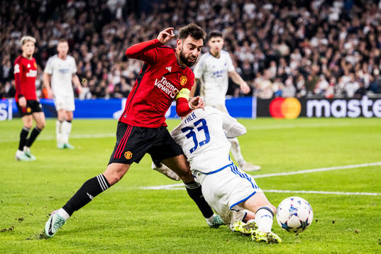 Bruno Fernandes of Manchester United and Rasmus Falk of FC