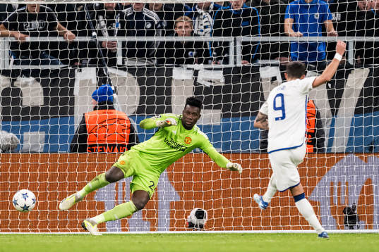 Goalkeeper André Onana of Manchester United and Diogo