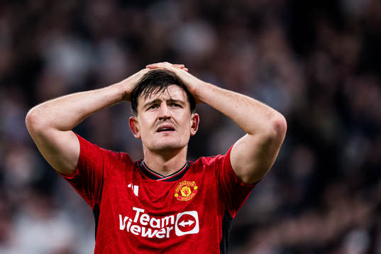 Harry Maguire of Manchester United looks dejected