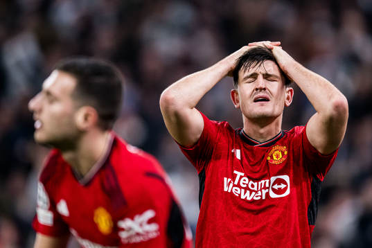 Harry Maguire of Manchester United looks dejected
