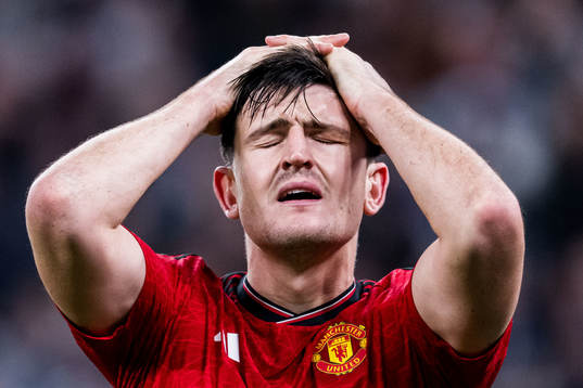 Harry Maguire of Manchester United looks dejected