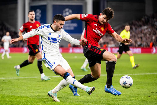 Roony Bardghji of FC Copenhagen and Harry Maguire of