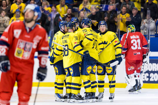 Players of Sweden celebrate