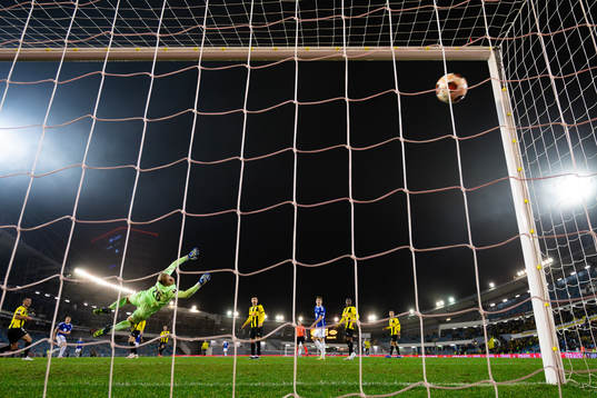 Kristian Eriksen of Molde scores 1-3 behind goaltender