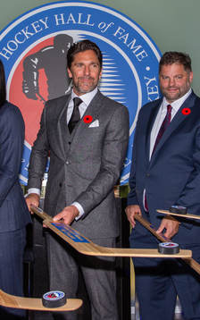 Henrik Lundqvist flips a puck