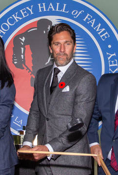 Henrik Lundqvist flips a puck