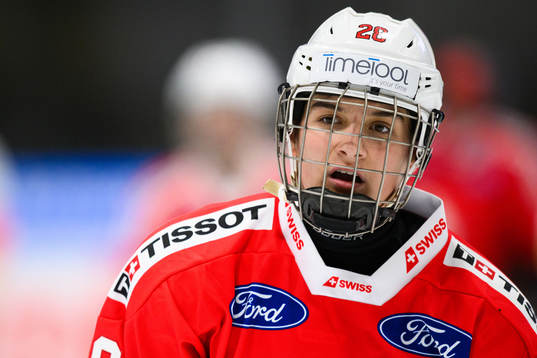 Alina Marti of Switzerland looks dejected