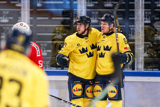 Mario Kempe and Marcus Sylvegård of Sweden celebrate