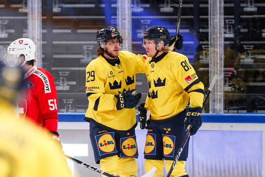 Mario Kempe of Sweden celebrates with Marcus Sylvegård