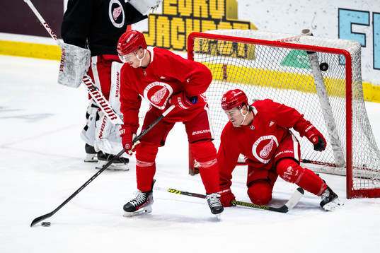 Lucas Raymond and Alex DeBrincat of Detroit Red Wings