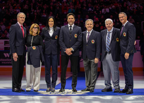 Henrik Lundqvist (centre) and his fellow inductees