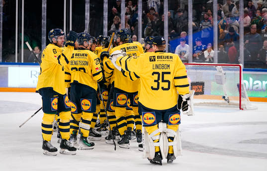 Players of Sweden celebrating