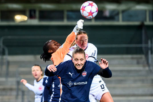 Goalkeeper Angel Mukasa and Gudrun Arnardottir  of FC