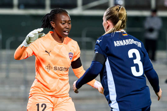 Goalkeeper Angel Mukasa and Gudrun Arnardottir of FC