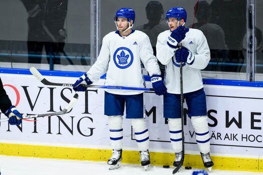 Calle Järnkrok and David Kampf of Toronto Maple Leafs