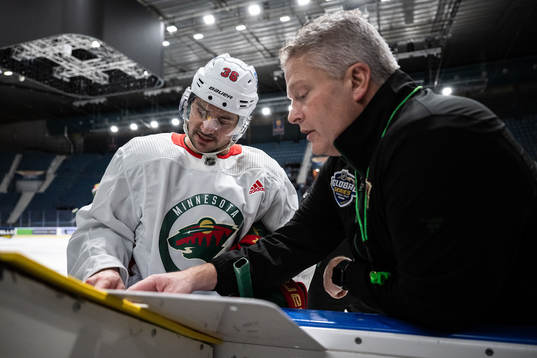 Mats Zuccarello and assistant coach Bob Woods of the