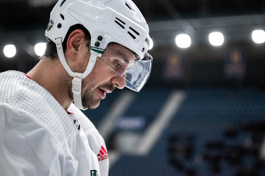 Mats Zuccarello and assistant coach Bob Woods of the