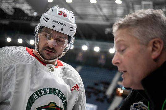 Mats Zuccarello and assistant coach Bob Woods of the