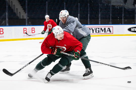 Brandon Duhaime and Joel Eriksson Ek of Minnesota Wild
